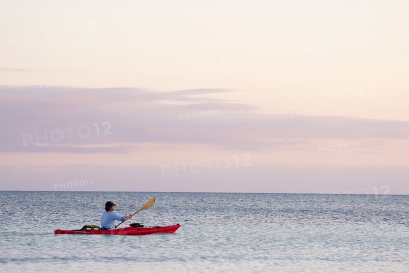 Man Kayaking on Ocean, Florida Keys, USA
