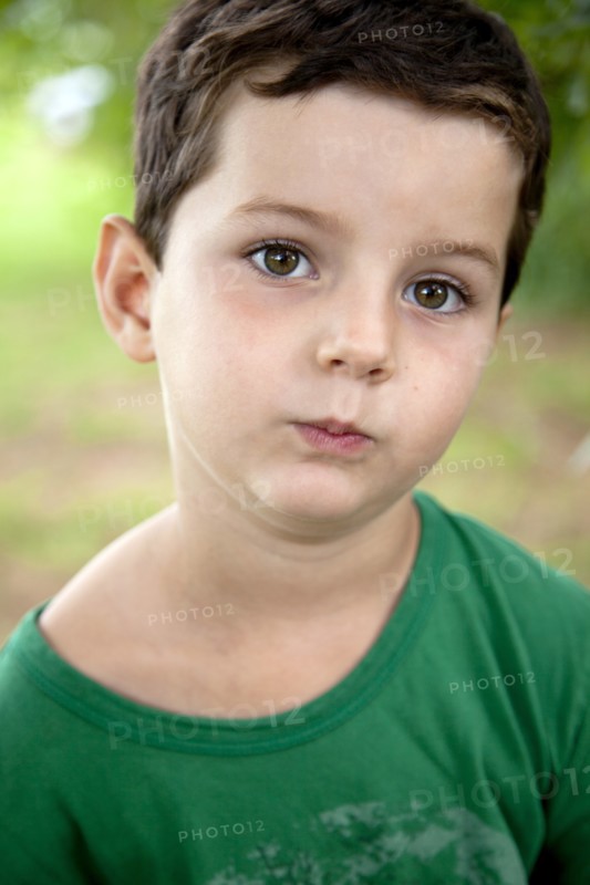 Young Boy With Pursed Lips, Portrait