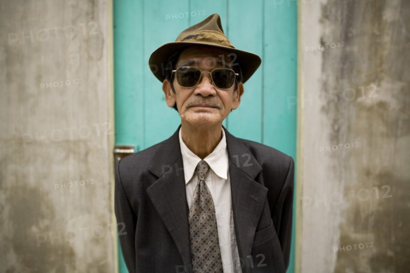 Vietnamese Man in Suit, Hat and Sunglasses