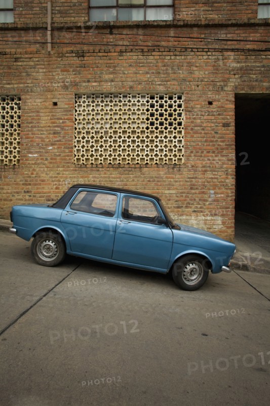 Small Blue Car Parked on Steep Road, San Gil, Colombia