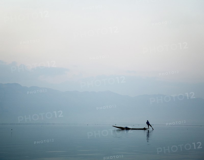Man Leg Rowing on Lake Inle in Burma
