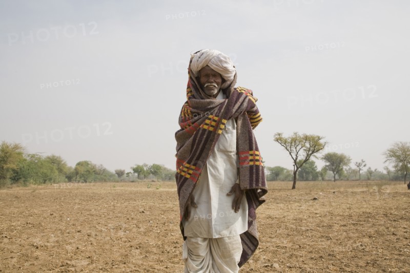 Older Indian Man in Field