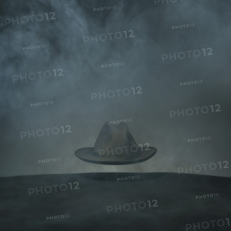 Wide-Brimmed Hat Floating in Fog