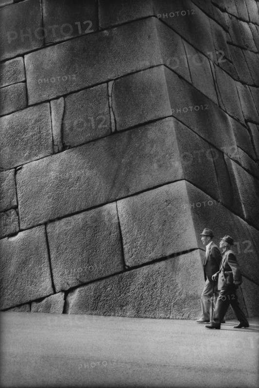 Two Men Walking by Imperial Palace Stone Wall, Tokyo, Japan