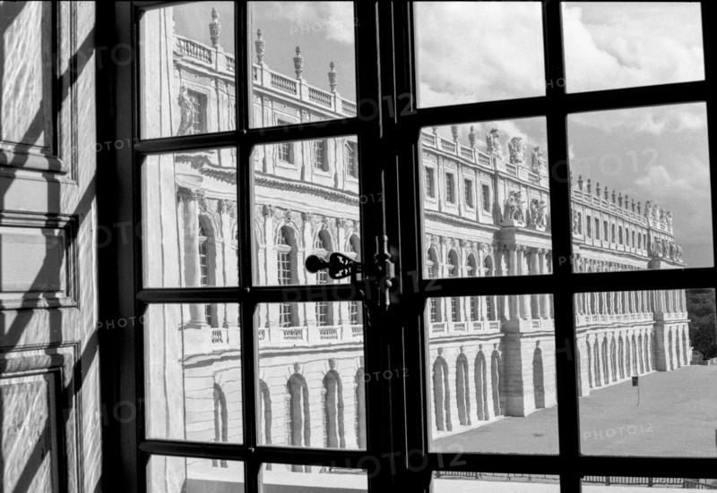 Side View of Versaille Palace through Window in Hall of Mirrors, France