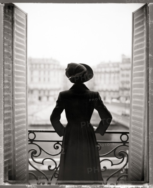 Woman Standing on Balcony, Rear View, Paris, France,