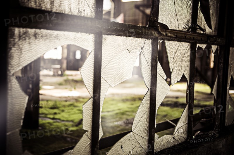 Broken Window in Abandoned Warehouse