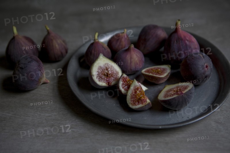 Sliced and Whole Figs on Plate