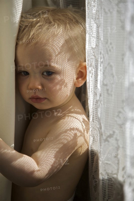 Melancholy Baby Between Curtains