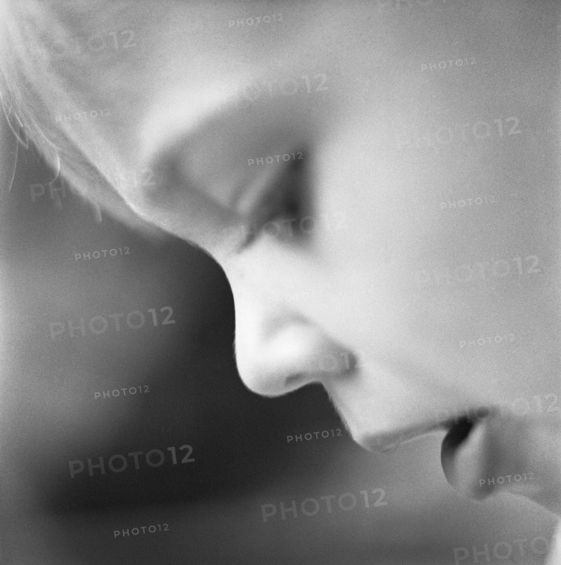 Young Boy Looking Down, Close-Up Profile
