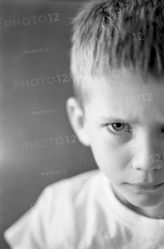 Young Boy With Angry Expression