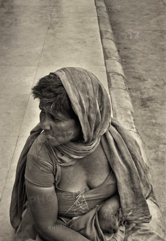 Woman Beggar on Sidewalk, India