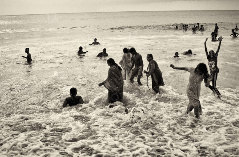 Group of People Playing in Ocean, India