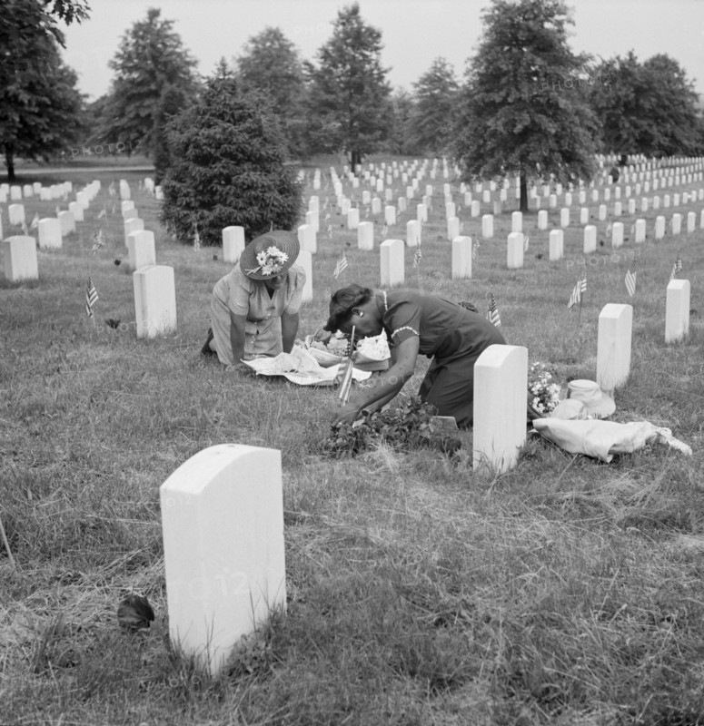 Two Women Decorating Soldier's Grave on Memorial Day, Arlington National Cemetery, Arlington, Virginia, USA, Esther Bubley for Office of War Information, May 1943