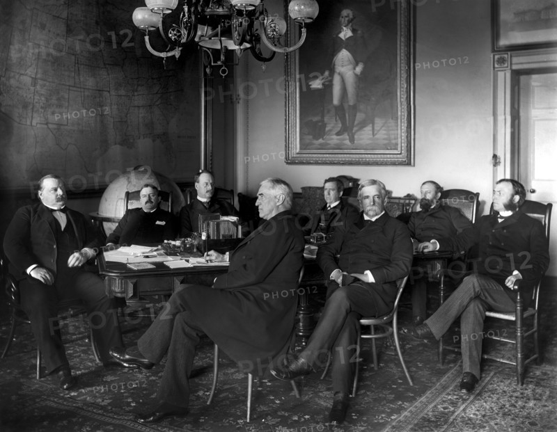 U.S. President Grover Cleveland with members of his Cabinet, L-R: President Grover Cleveland; Charles S. Fairchild, Secretary of the Treasury; William C. Whitney, Secretary of the Navy; Augustus H. Garland, Attorney General; Thomas F. Bayard, Secretary of State; William C. Endicott, Secretary of War; William F. Vilas, Secretary of the Interior; and Donald M Dickinson, Postmaster General, Photograph by Charles Milton Bell, Washington DC, USA, 1889