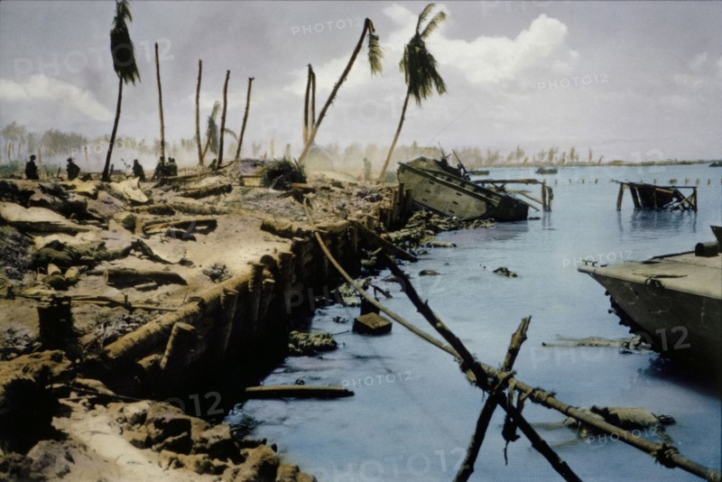 Dead Bodies in Water and on Beach with onlooking U.S. Marines during Battle of Tarawa, Tarawa Atoll, Gilbert Islands, November 1943