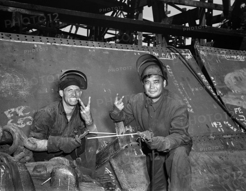 Two Electric Welders Helping to Build Liberty Ship Frederick Douglass, Bethlehem-Fairfield Shipyards, Baltimore, Maryland, USA, Roger Smith, U.S. Office of War Information, May 1943