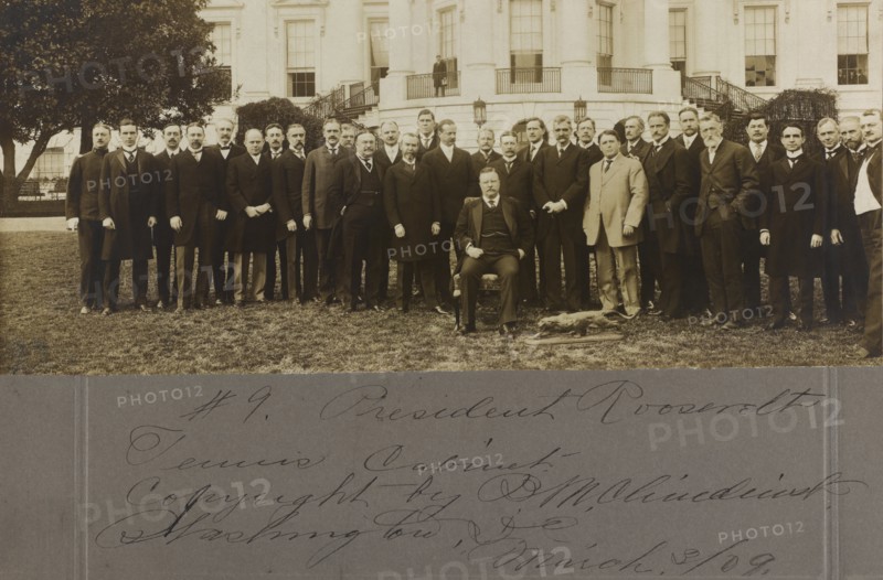 U.S. President Theodore Roosevelt at Farewell Event on White House Lawn for his "Tennis Cabinet", Bronze Statue of Crouching Cougar by Alexander P. Proctor, Presented to Roosevelt by the group, is at his feet, Washington, D.C., USA, Photograph by Barnett McFee Clinedinst, March 5, 1909