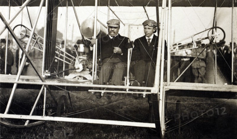Theodore Roosevelt and Archibald Hoxsey in Biplane Preparing for Flight, Kinloch Field, St. Louis, Missouri, USA, Photograph by Cole & Co., October 11, 1910