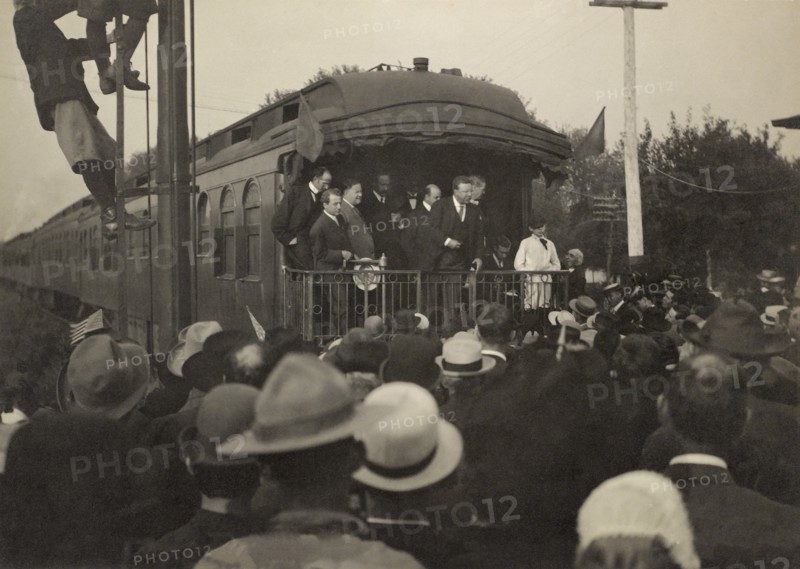 Former President Theodore Roosevelt Greeting Crowd from Back of Railroad Car, Baldwin, Kansas, USA, Photograph by A. Bridwell, August 31, 1910