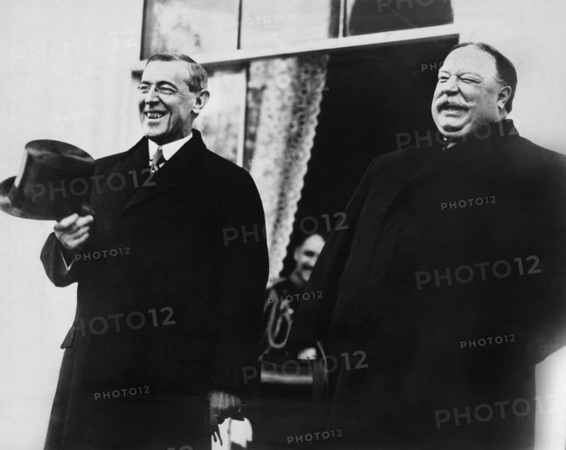 U.S. President-elect Woodrow Wilson and U.S. President William Howard Taft, Standing side by side, Laughing,  prior to Wilson's Inauguration Ceremonies, White House, Washington, D.C., USA, March 4, 1913