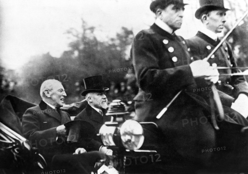 U.S. President Woodrow Wilson and French President Raymond Poincaré riding in open Carriage at beginning of Paris Peace Conference, Paris, France, Photograph by E. McConnell, December 14, 1918
