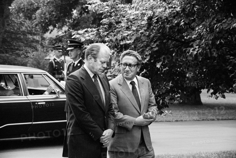 U.S. President Gerald Ford and Secretary of State Henry Kissinger, conversing, on the grounds of the White House, Washington, D.C., USA, photograph by Thomas J. O'Halloran, August 16, 1974