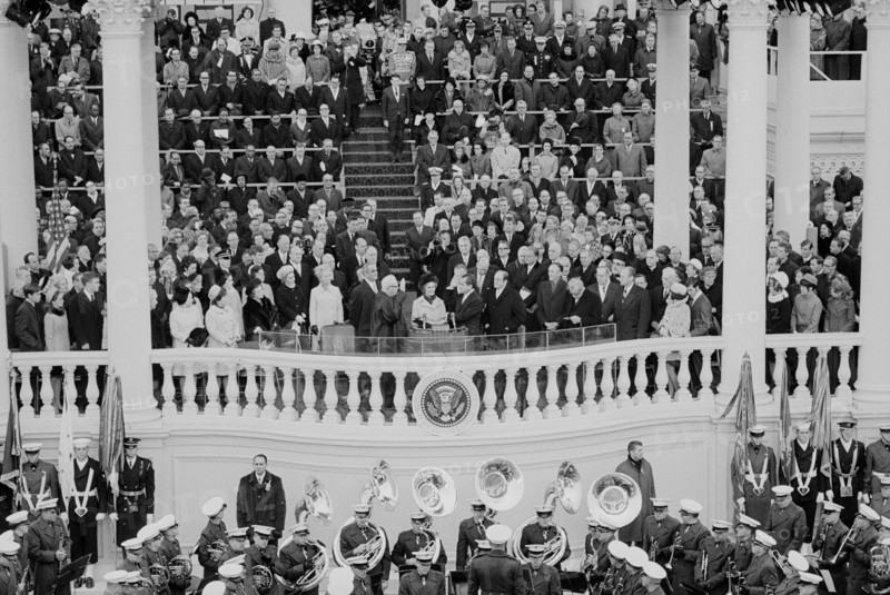 Chief Justice Earl Warren administering the oath of office to Richard M. Nixon on the east portico of the U.S. Capitol, Washington DC, USA, photograph by Thomas J. O'Halloran, January 20, 1969