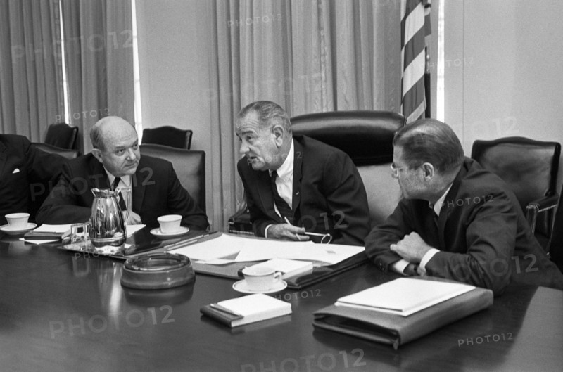 U.S. Secretary of Defense Robert McNamara (right), U.S. President Lyndon Johnson and U.S. Secretary of State Dean Rusk, seated at a table after McNamara's return from South Vietnam, Washington, D.C., USA, photograph by Warren K. Leffler, July 21, 1965