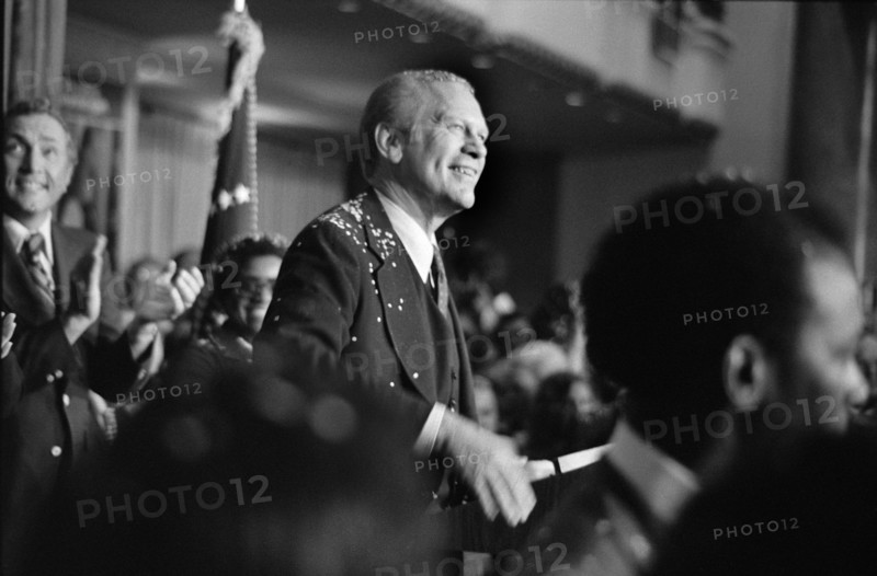 U.S. President Gerald Ford, covered with Confetti, smiles at Crowd after his arrival for 1st Presidential Debate with Democratic Presidential Nominee Jimmy Carter, Philadelphia, Pennsylvania, USA, photograph by Marion S. Trikosko, September 23, 1976