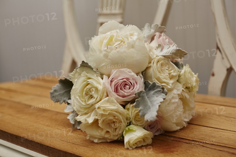 Bouquet of Flowers on Wood Bench