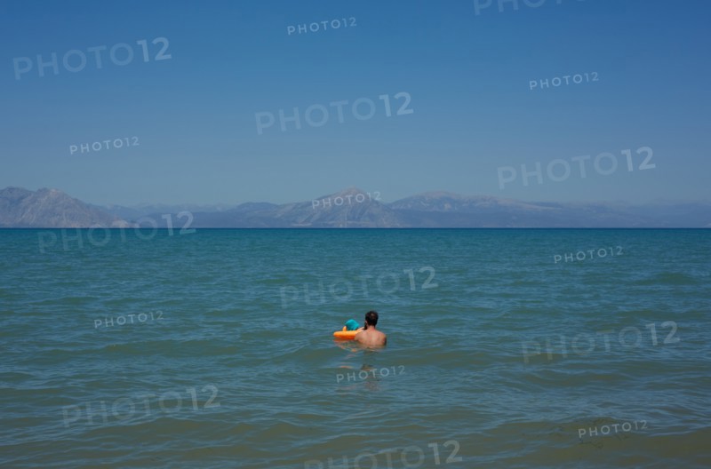 Man and Young Child Swimming, Patras, Greece