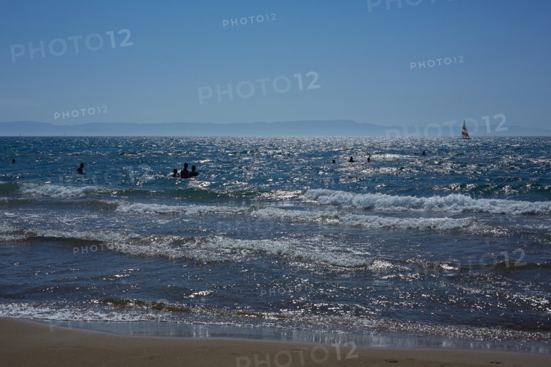 Silhouette of People Swimming in Sea, Patras, Greece