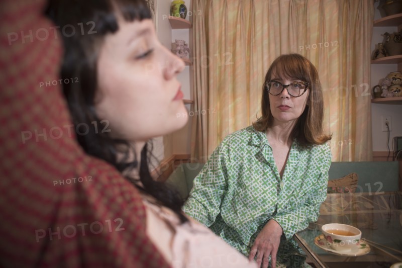 Two Women in Nightwear having a Serious Discussion