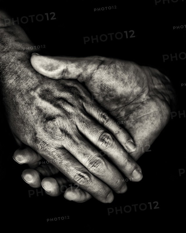 Two Hands on Black Background