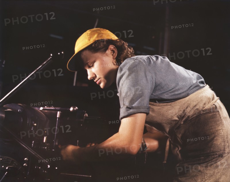 Lathe Operator machining Parts for Transport Planes