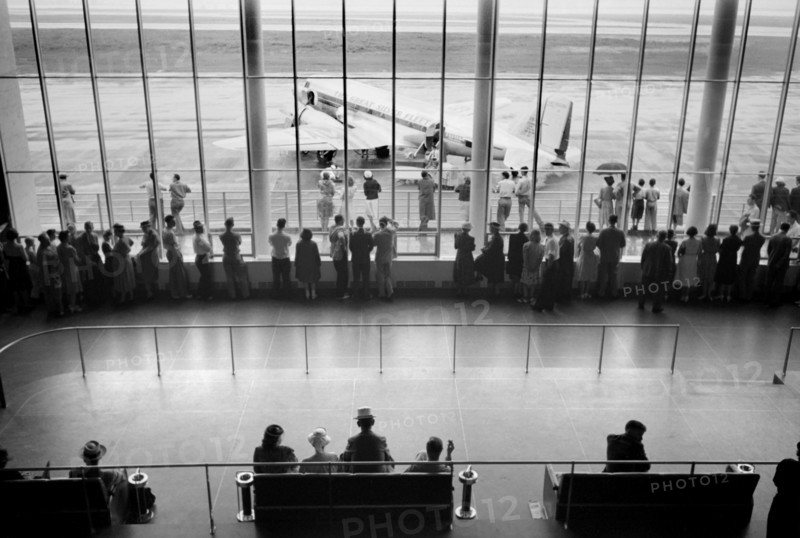 Visitors watching Airplanes from Waiting Area