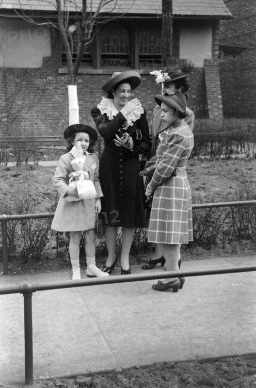 Group of People talking in Front of Church