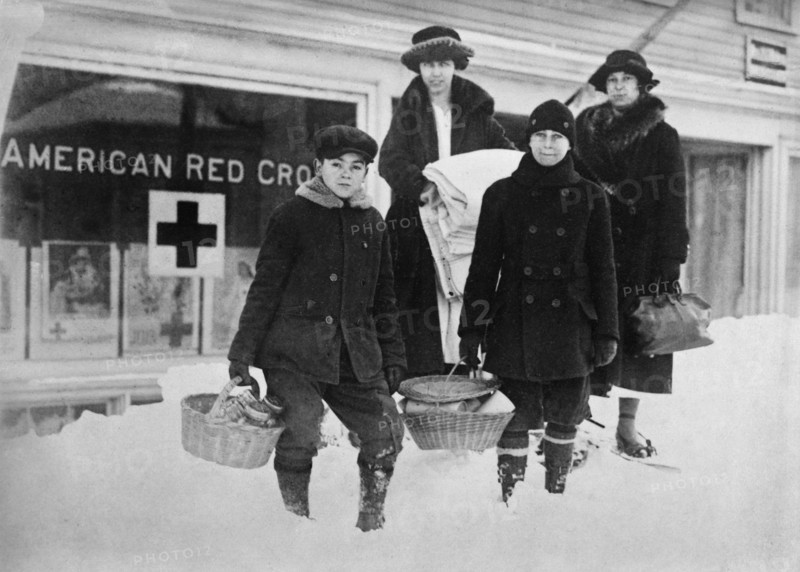 Small Group of Volunteers leaving Red Cross Headquarters with Supplies for the sick during Influenza Epidemic