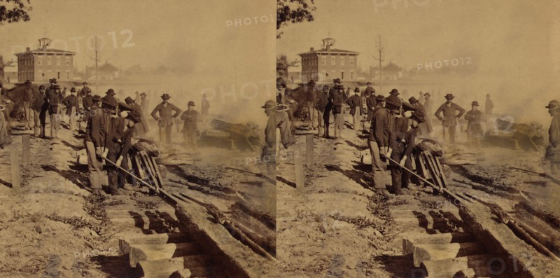 Group of Union Soldiers tearing up Confederate Railroad Tracks before evacuating Atlanta