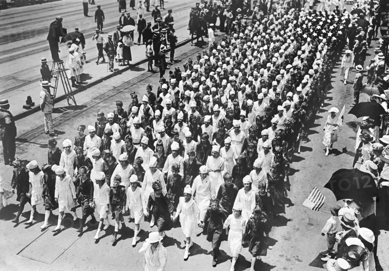Junior Red Cross Auxiliary forming American Flag