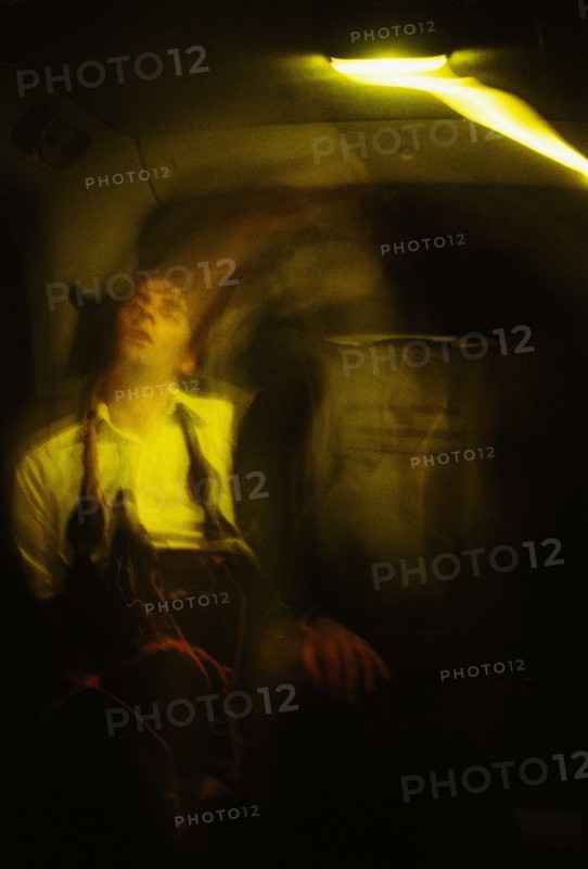Drunk Young Adult Man in Taxi