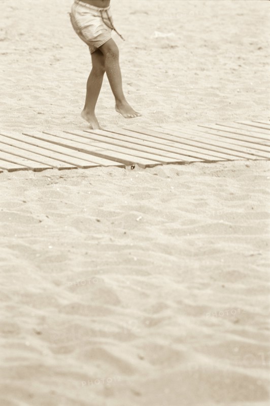 Waist-Down View of Beach Boy