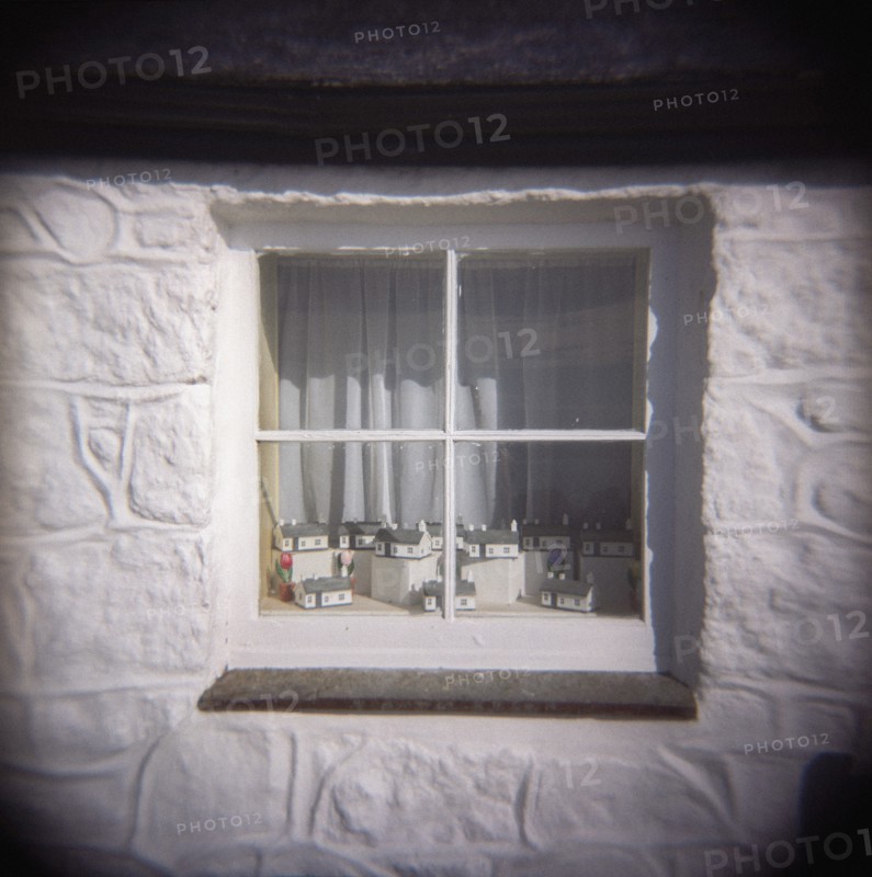 Miniature Models of First and Last House in Window Display