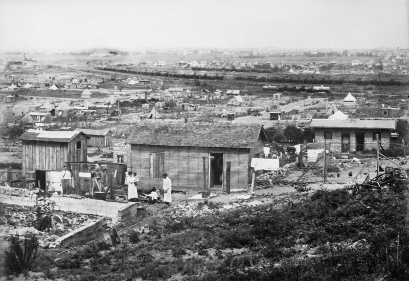 Reconstruction after Destruction by Fire caused by Race Riots