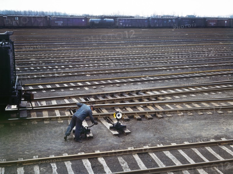 Switchman throwing a switch at Chicago and North Western Railroad's Proviso Yard