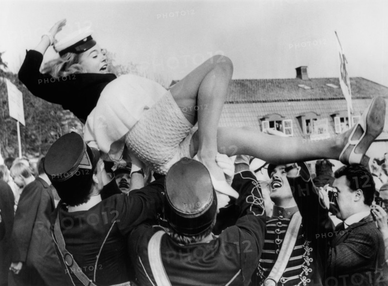 Actress Pia Degermark being lifted in the air during Graduation Ceremonies at the Exclusive Sigtunaskolan