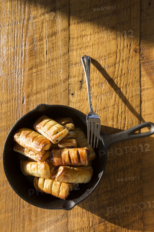 High Angle View of Apple Pastries with Fork in Cast Iron Skillet