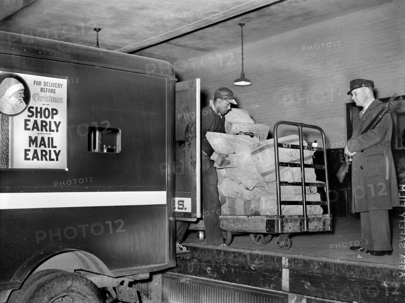 Workers on loading platform putting mail on Trucks, Main Post Office, 1938