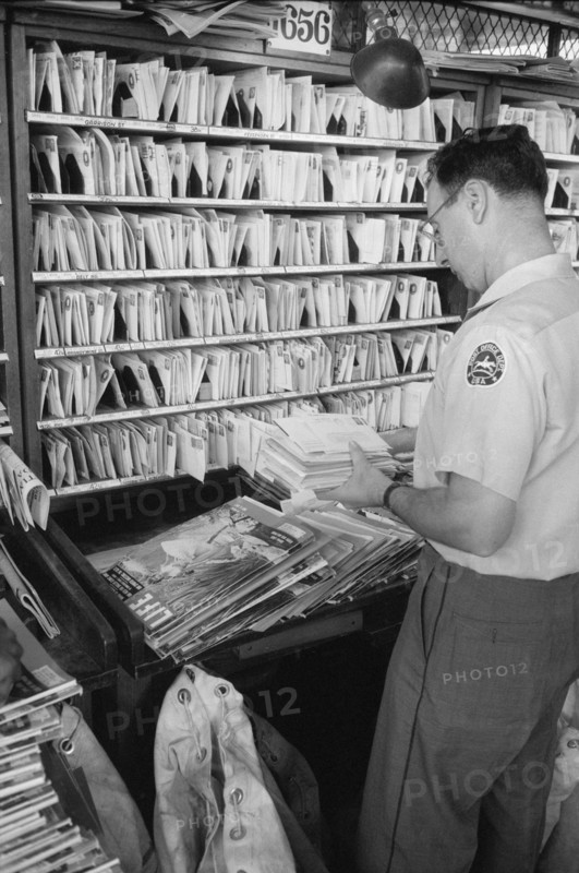 Workers sorting mail at Post Office, New York City, May 1957